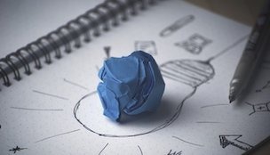 Picture of a light bulb and a paper ball