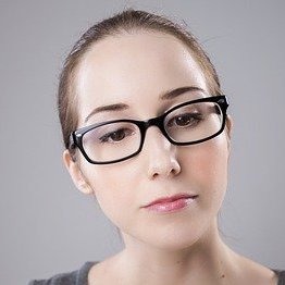 Picture of a female student with black glasses